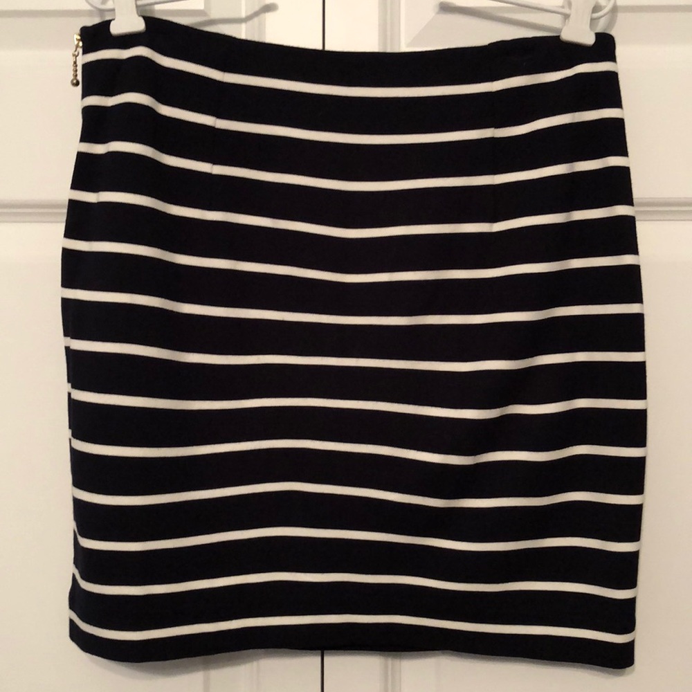 Black and white striped skirt.